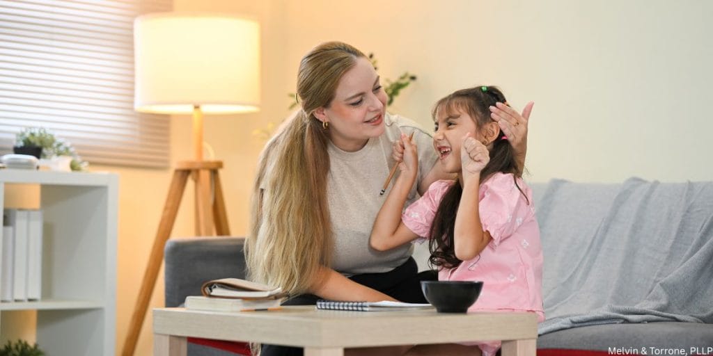 Parent supporting child through divorce and social development adjustment period