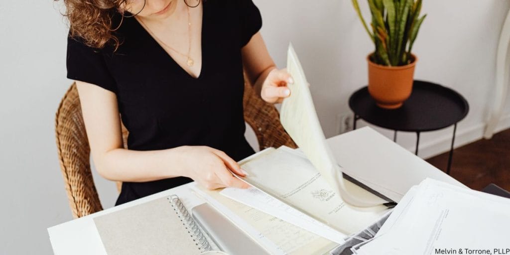 Woman documenting financial records before divorcing a narcissist