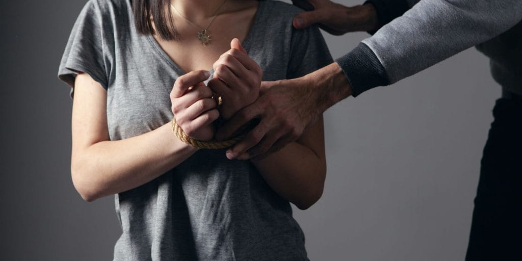 woman dealing with Domestic Violence by Proxy